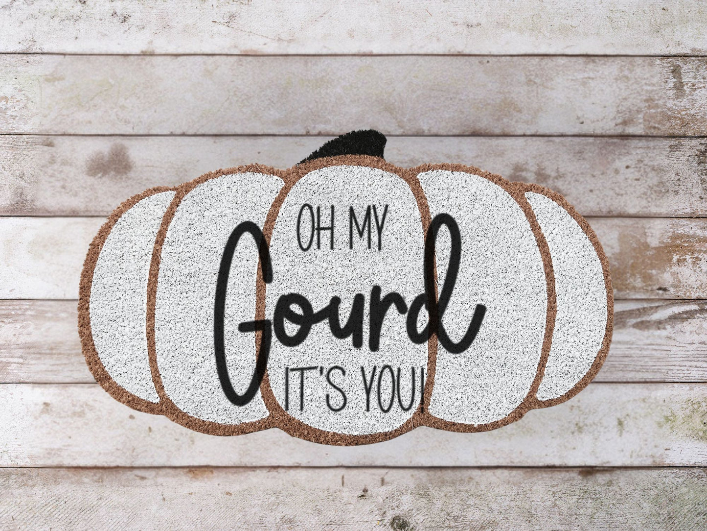 Coir doormat with the phrase “Oh My Gourd, It’s You!” in bold black lettering, ideal for fall front porch décor.