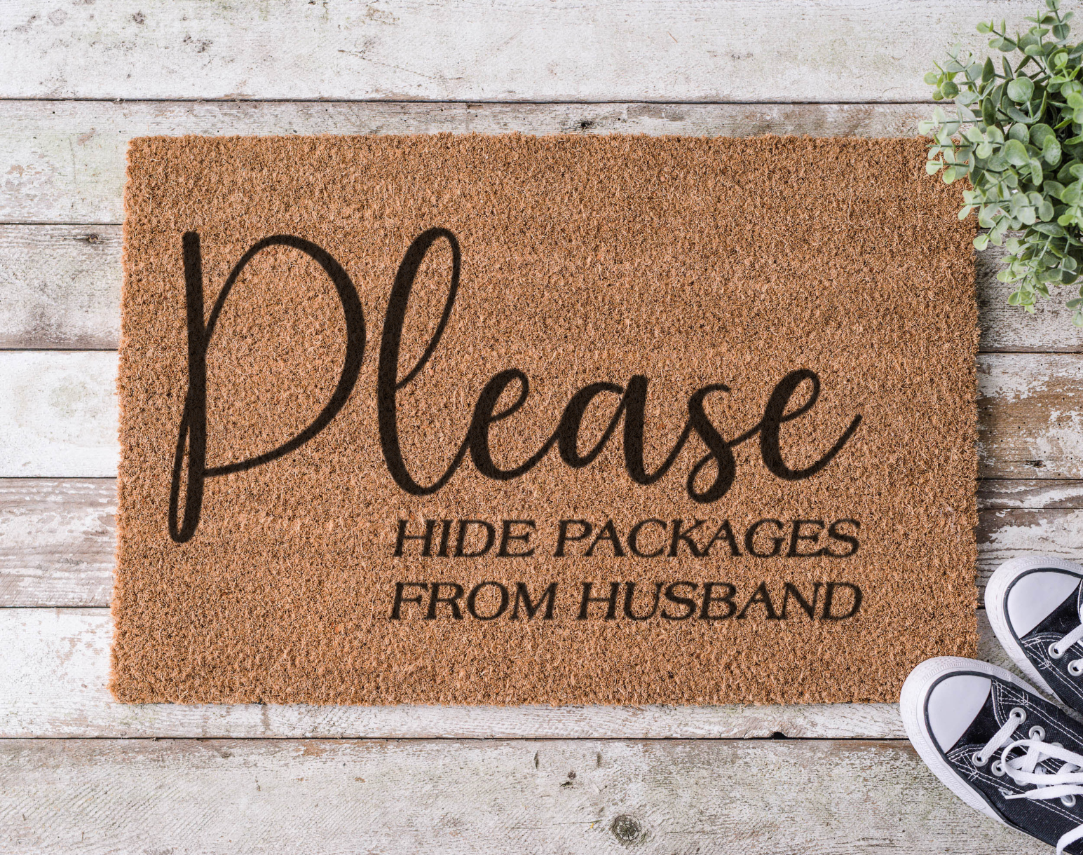 Coir doormat with the phrase ‘Please Hide Packages from Husband,’ hand-painted in playful black lettering with a humorous tone