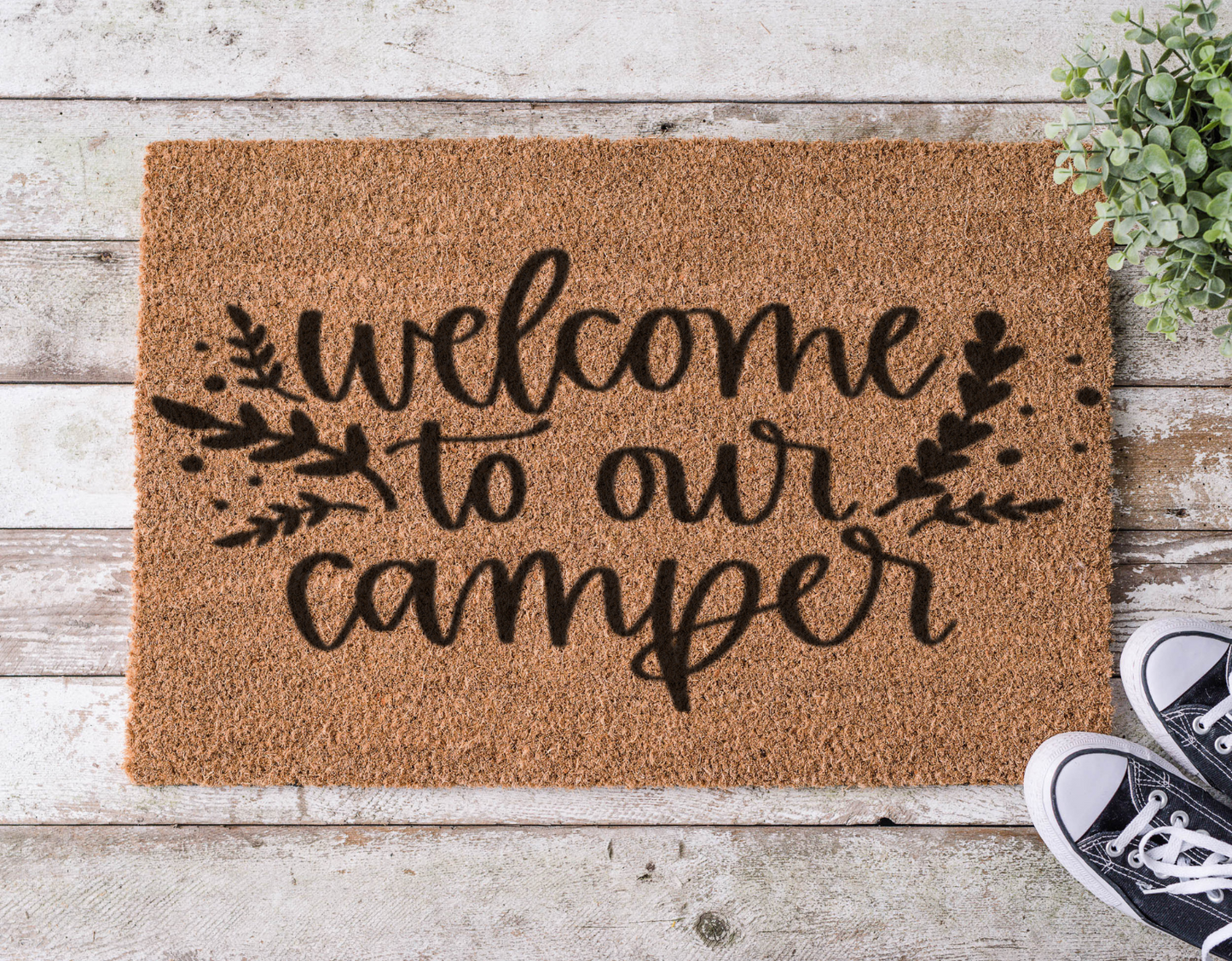 Coir doormat with the phrase ‘Welcome to Our Camper,’ hand-painted with a cozy camping theme