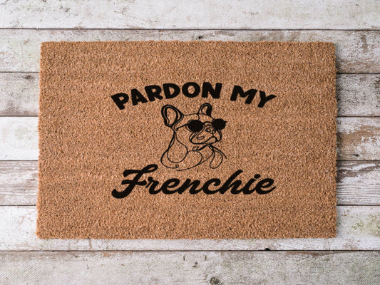 Coir doormat with the phrase ‘Pardon My Frenchie,’ hand-painted in playful lettering with a French Bulldog design