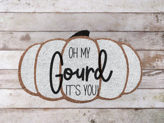 Coir doormat with the phrase “Oh My Gourd, It’s You!” in bold black lettering, ideal for fall front porch décor.