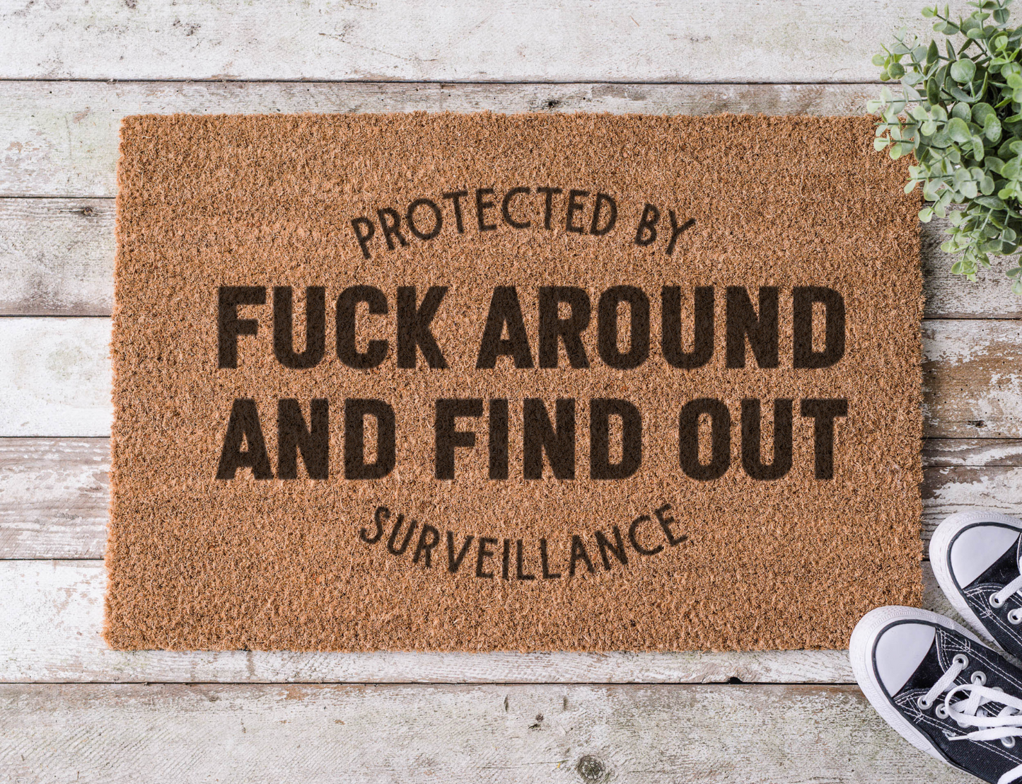 Coir doormat with the phrase ‘Fuck Around and Find Out,’ hand-painted in bold black lettering with a tough, no-nonsense vibe