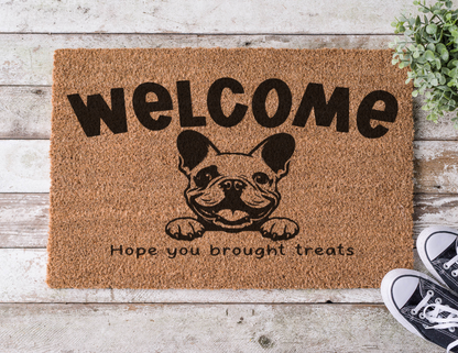 Coir doormat with the phrase ‘Hope You Brought Treats,’ hand-painted in bold lettering with a French Bulldog design