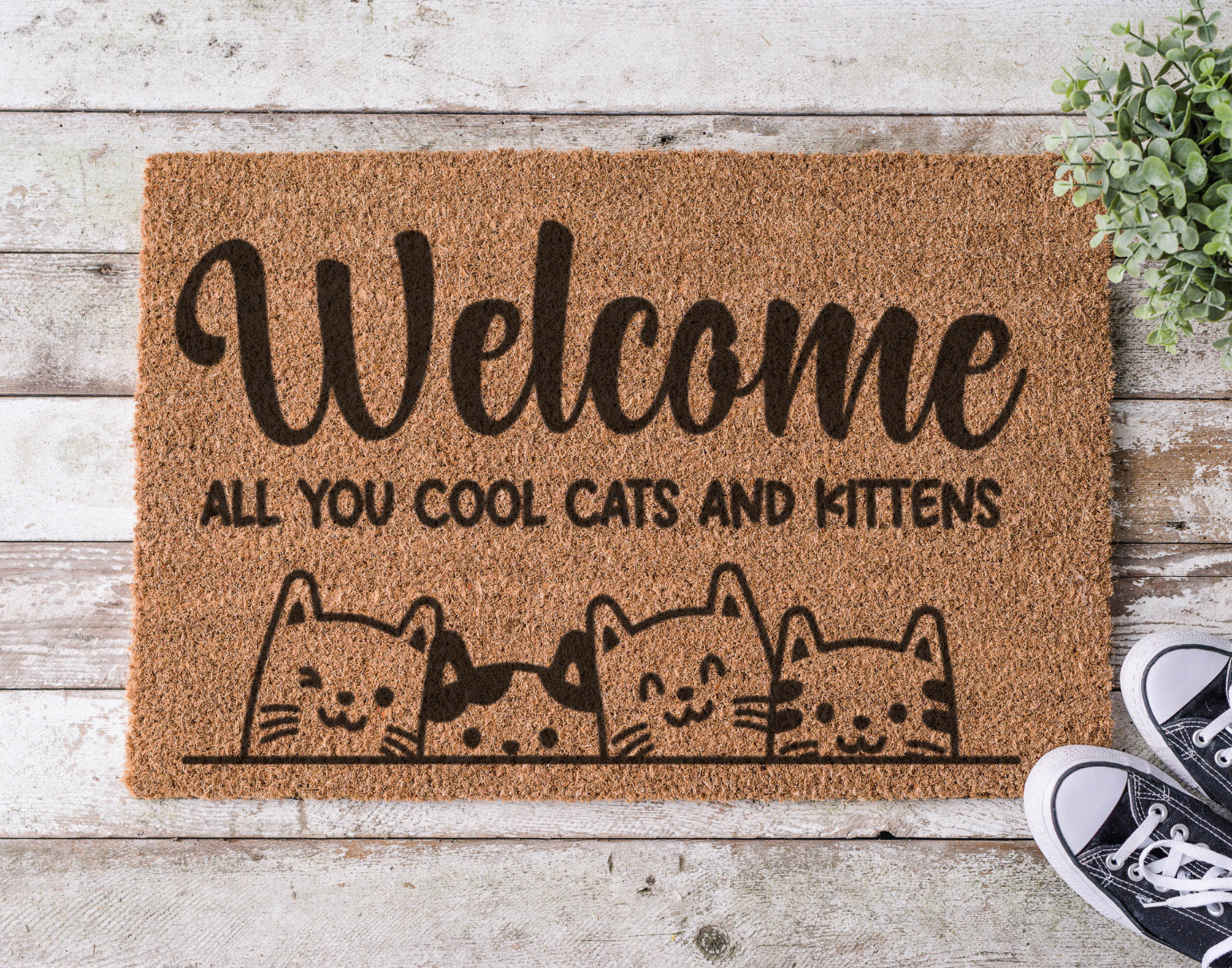Coir doormat with the phrase Welcome All You Cool Cats and Kittens,’ hand-painted in stylish lettering with a fun, feline-inspired vibe