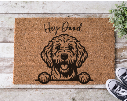 Coir doormat with the phrase ‘Hey Dood,’ hand-painted in fun, casual lettering with a doodle dog-inspired design
