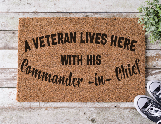 Coir doormat with the phrase ‘A Veteran Lives Here with His Commander in Chief,’ hand-painted in bold black lettering with a patriotic theme

