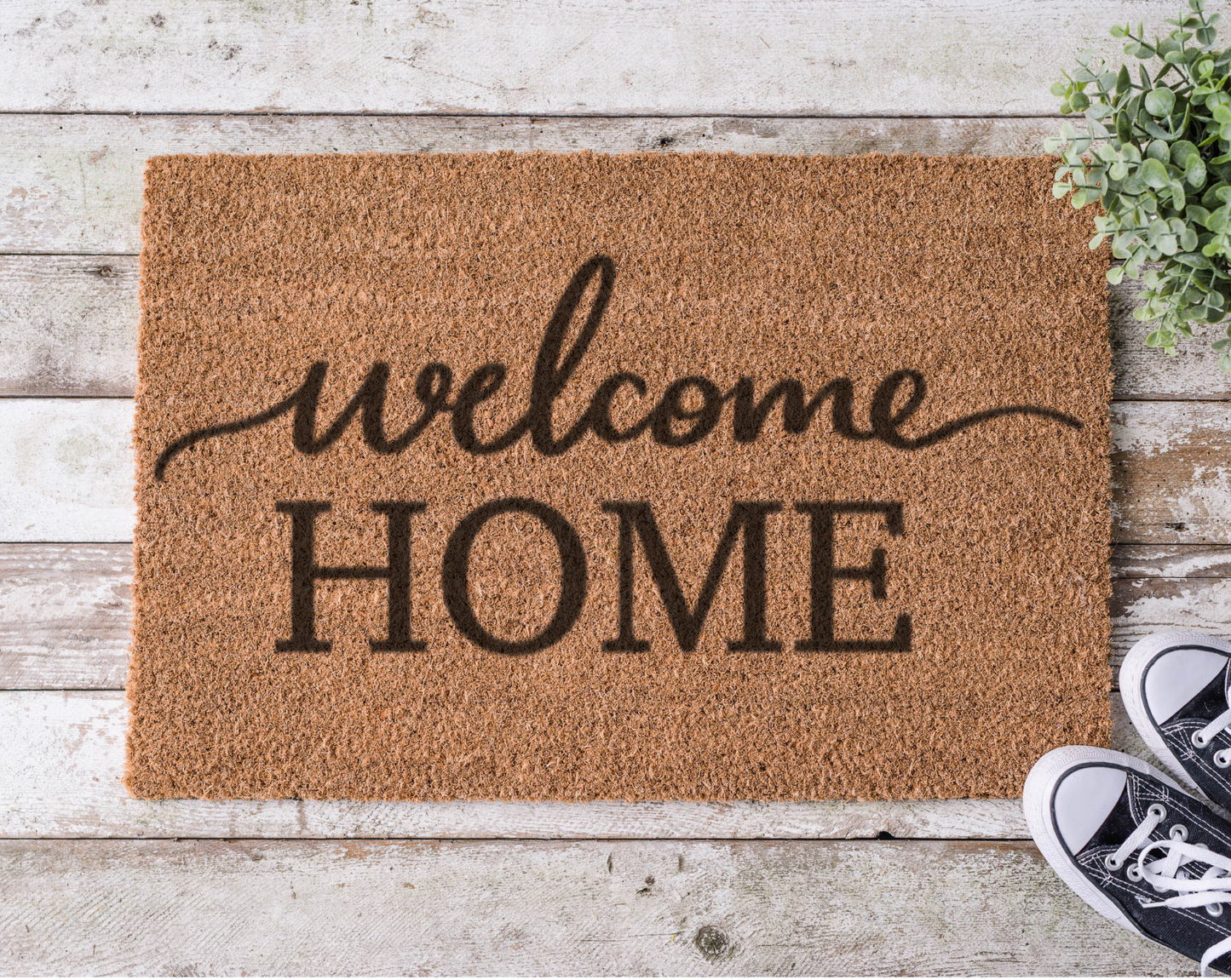 Coir doormat with the phrase ‘Welcome Home,’ hand-painted in elegant black script for a cozy, inviting entryway