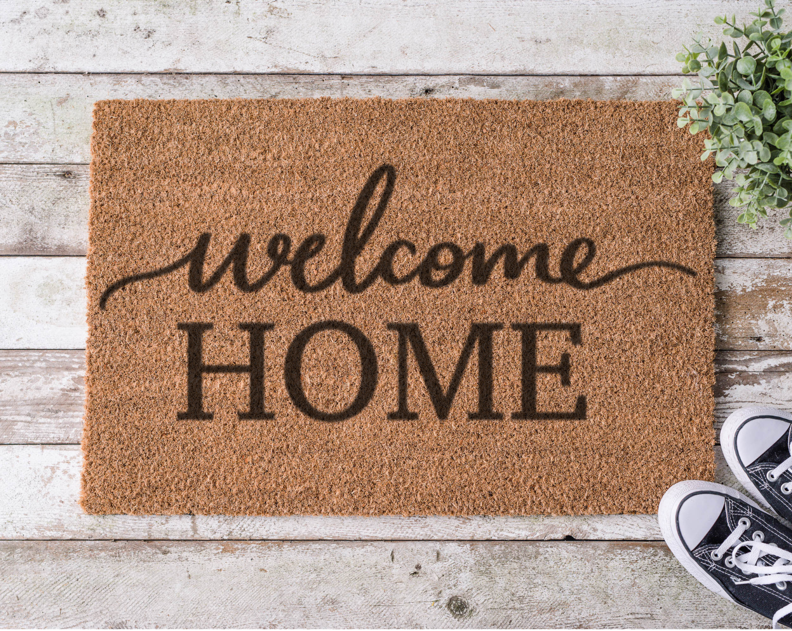 Coir doormat with the phrase ‘Welcome Home,’ hand-painted in elegant black script for a cozy, inviting entryway