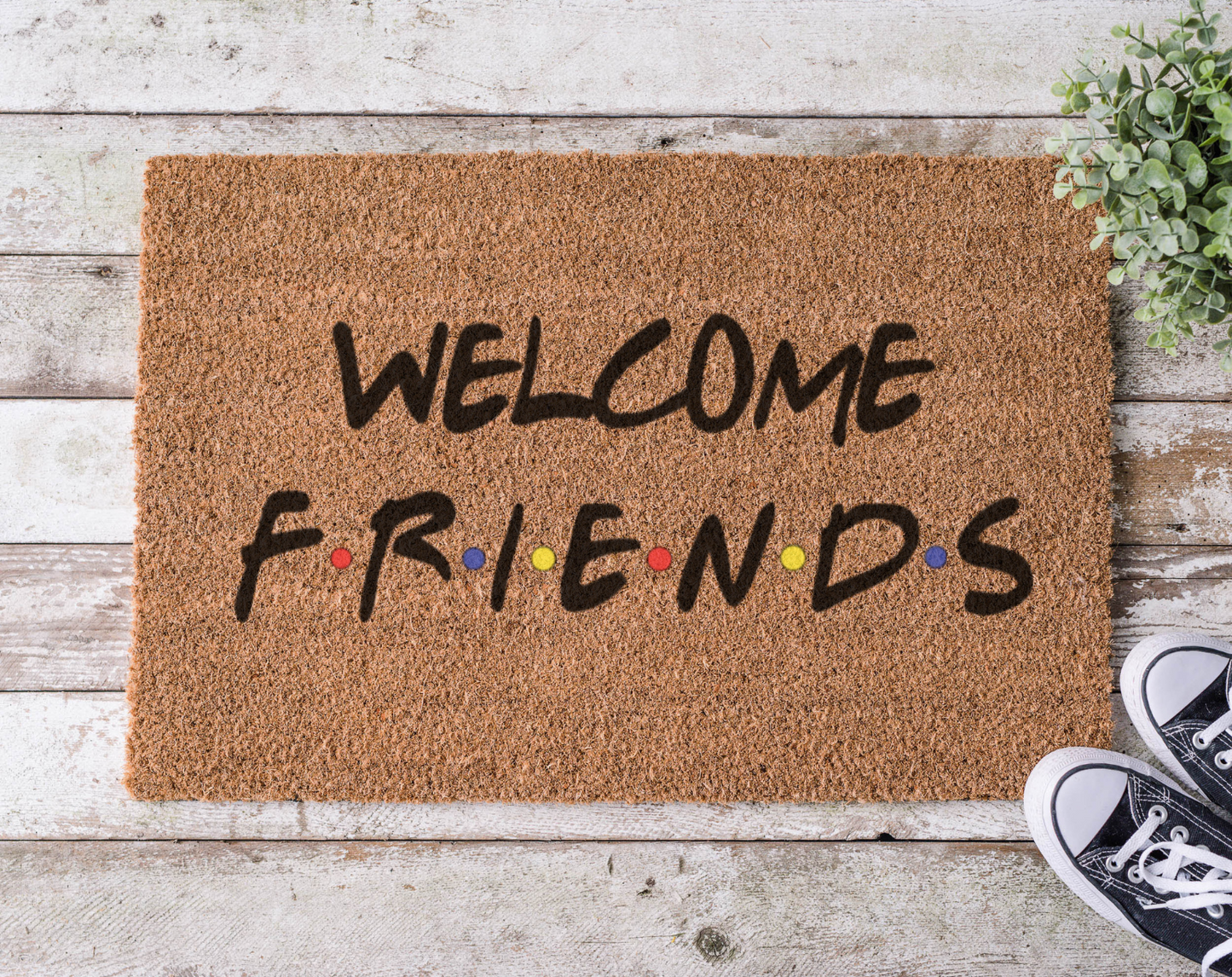 Coir doormat with the phrase ‘Welcome Friends,’ hand-painted in a style inspired by the Friends TV show title font and colors