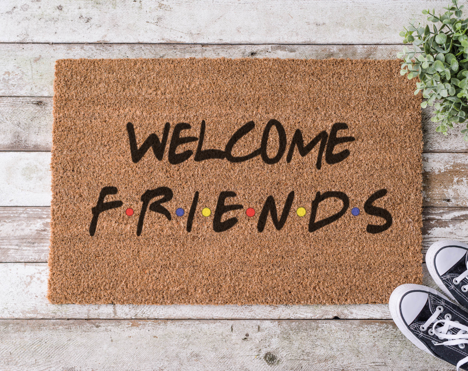 Coir doormat with the phrase ‘Welcome Friends,’ hand-painted in a style inspired by the Friends TV show title font and colors