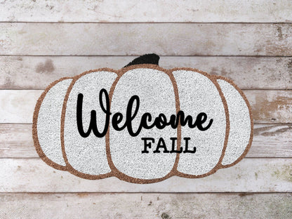 Coir doormat with the phrase "WELCOME FALL" in bold, rustic lettering—perfect for seasonal autumn porch decor.