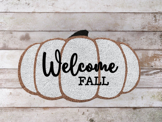 Coir doormat with the phrase "WELCOME FALL" in bold, rustic lettering—perfect for seasonal autumn porch decor.