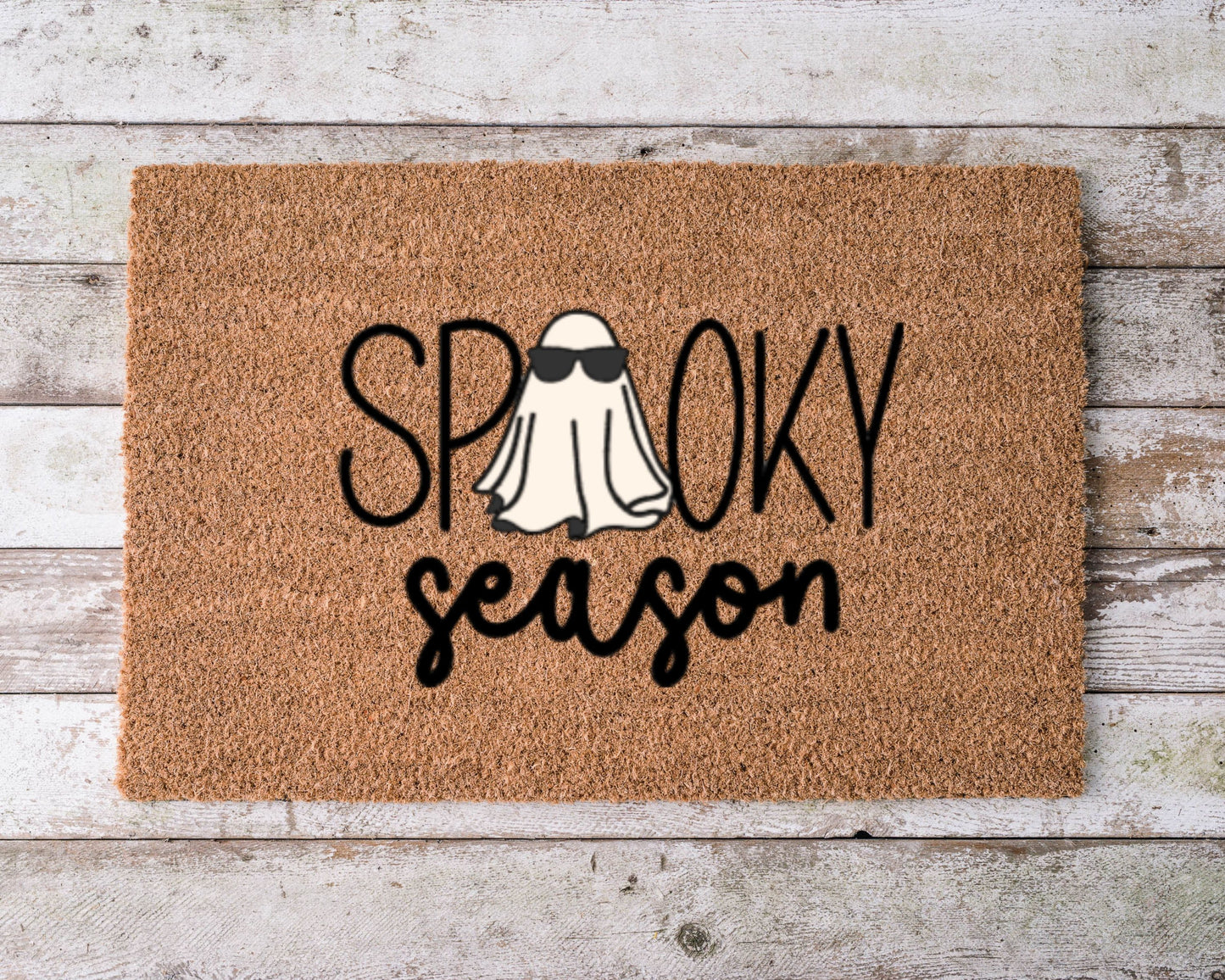 Hand-painted “Spooky Season” Halloween doormat with natural coir bristles, perfect for fall porch décor.