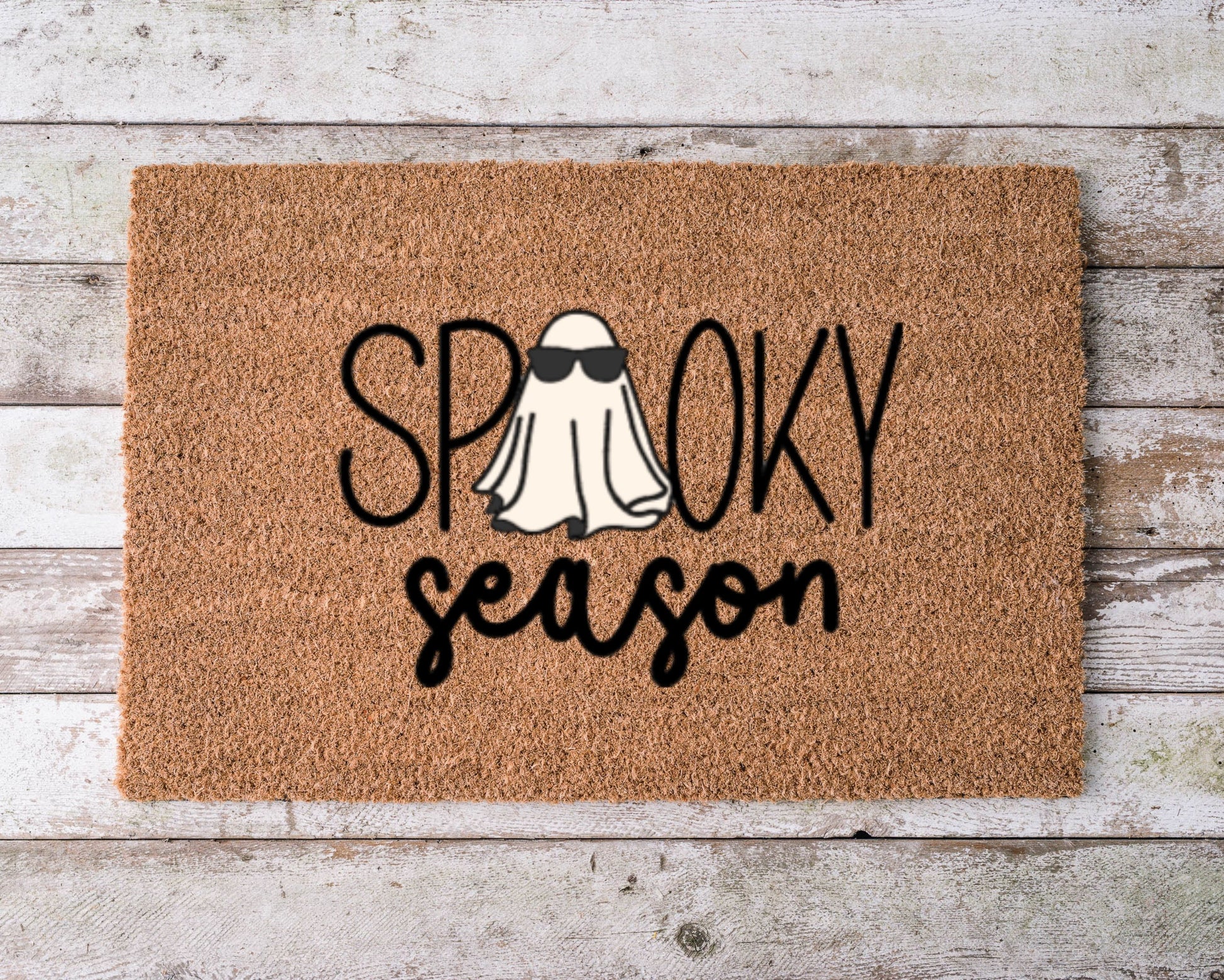 Hand-painted “Spooky Season” Halloween doormat with natural coir bristles, perfect for fall porch décor.